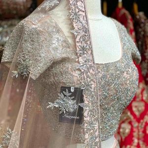 Nazranaa baby pink bridal lengha